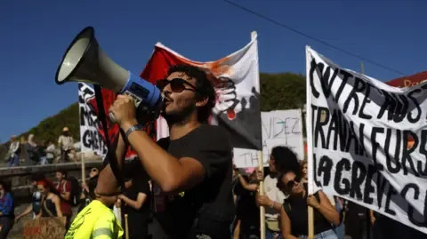 France-Wide Protests Begin In Response to Budget Reductions
